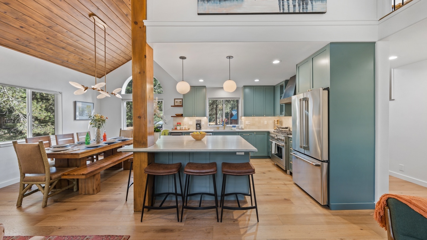 Open kitchen and dining area at Juniper House, a Tahoe Signature Properties home in Tahoe Donner