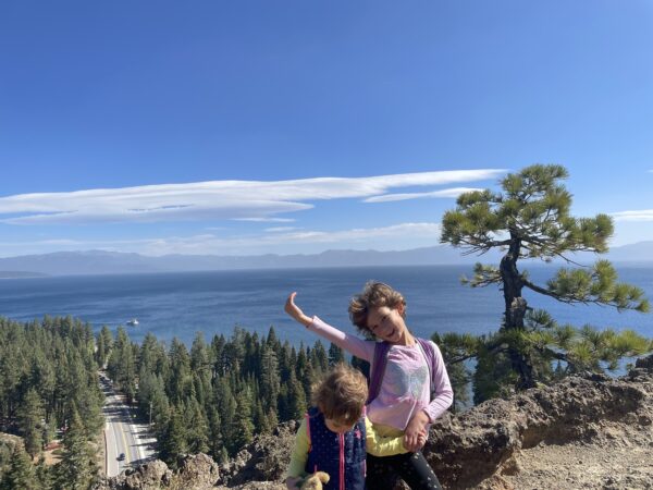 smiling kids hiking eagle rock Lake Tahoe