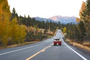 vintage truck driving on a road in the Sierra Nevadas