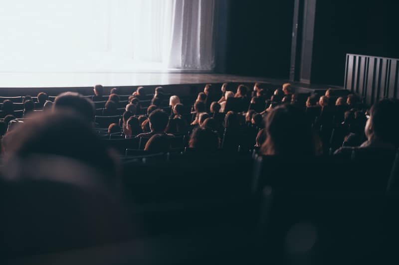 movie theatre audience enjoying a film