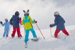 Little skiers before an off piste