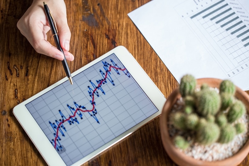 young business woman tracking profits and trends