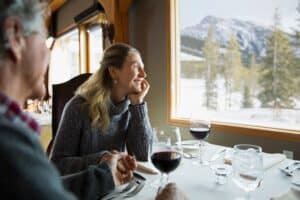 couple-holding-hands-at-restaurant-table-